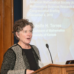 Karen Saxe of the American Mathematical Society introduces the speaker